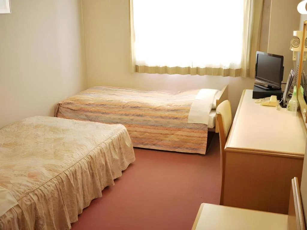 Bed in Hotel Fukui Castle