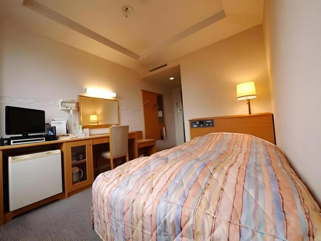 Bed in Hotel Fukui Castle