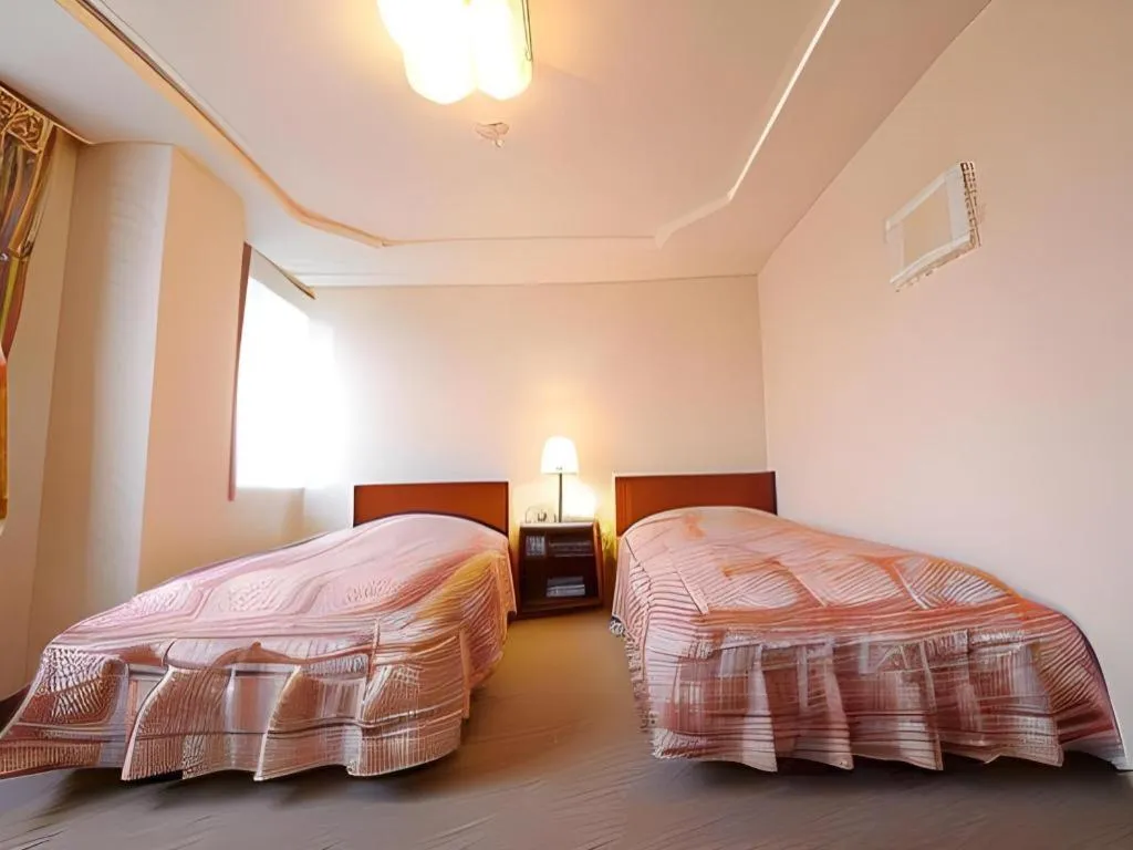 Bed in Hotel Fukui Castle