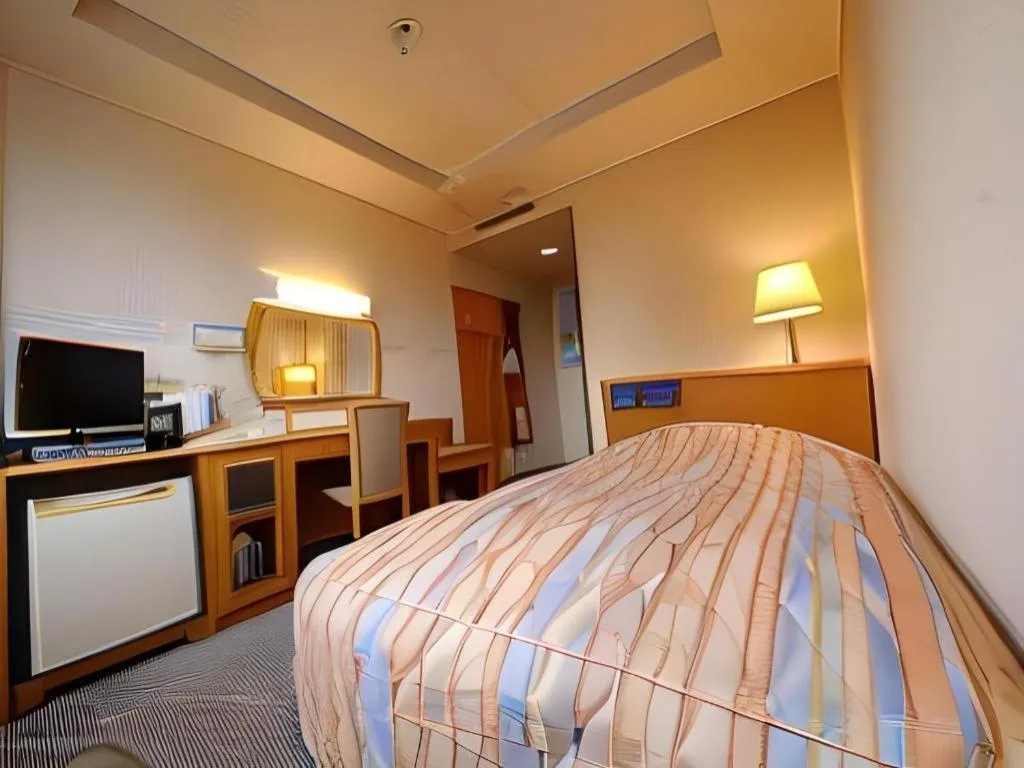 Bed in Hotel Fukui Castle