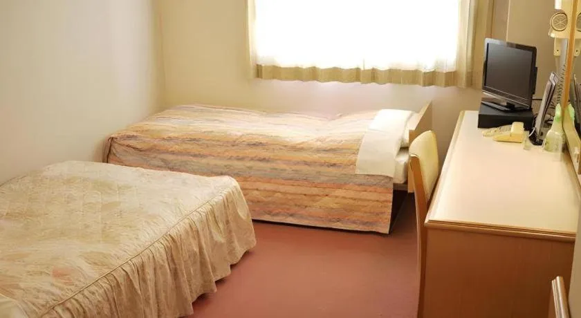 Bed in Hotel Fukui Castle