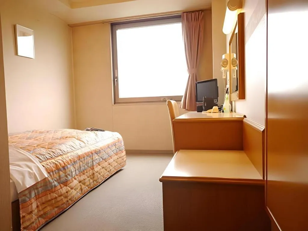 Bed in Hotel Fukui Castle