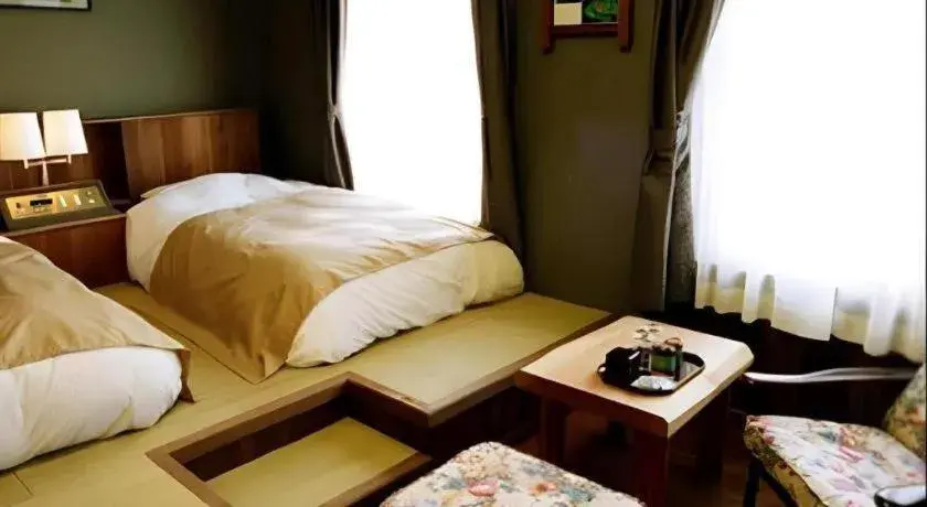 Bed in Auberge Kitano Dandan Bed in Auberge Kitano Dandan