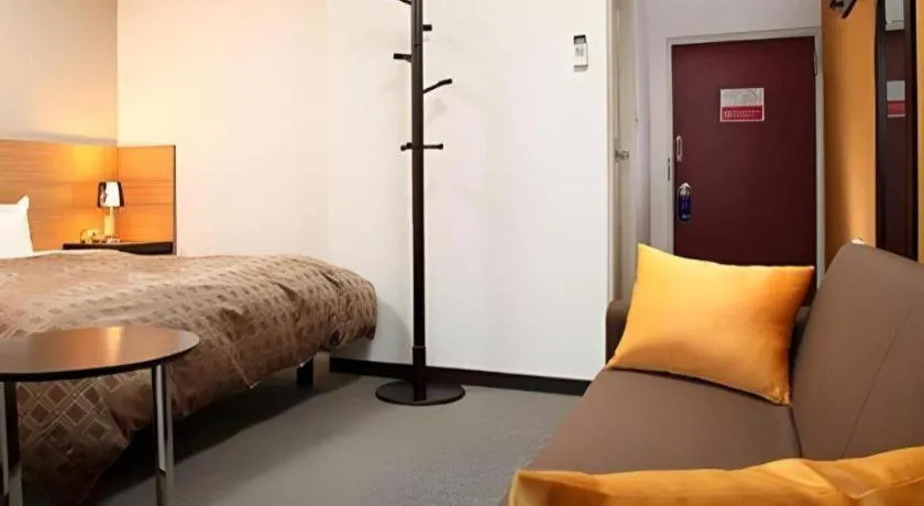 Bed in Hotel 1-2-3 Kofu Shingen Onsen