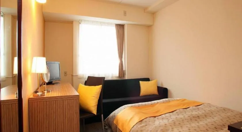 Bed in Hotel 1-2-3 Kofu Shingen Onsen