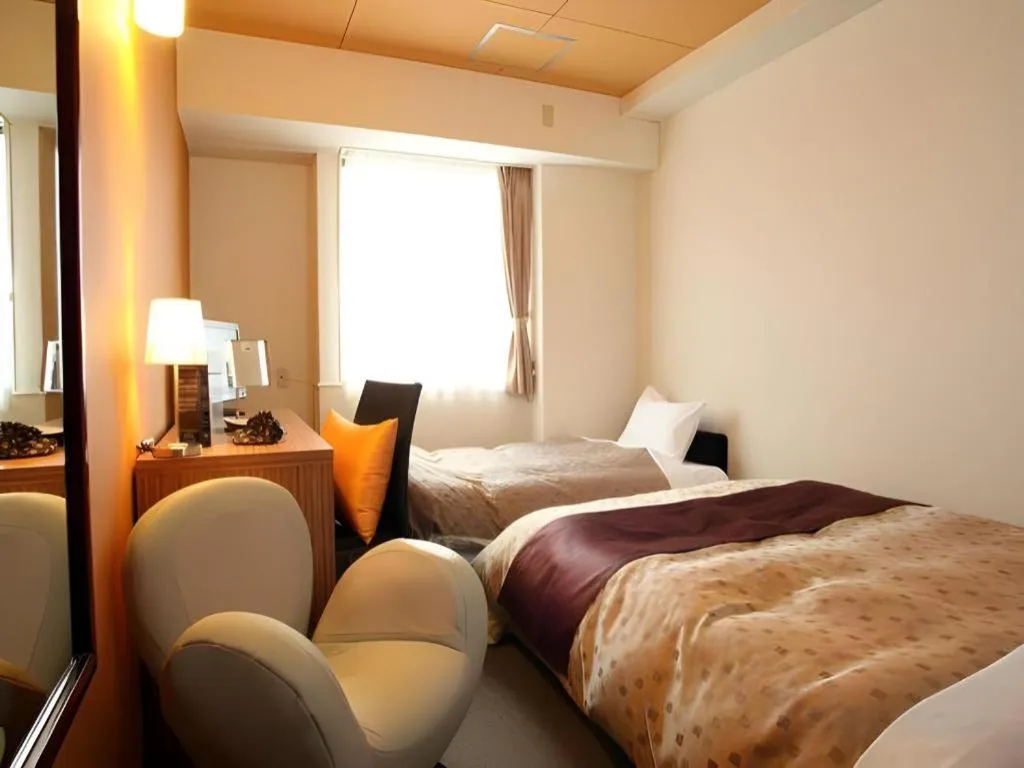 Bed in Hotel 1-2-3 Kofu Shingen Onsen