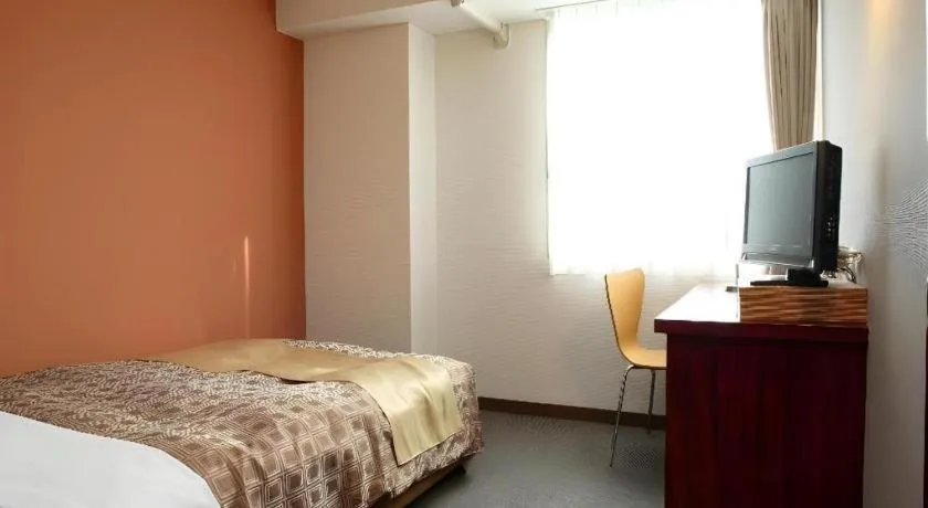 Bed in Hotel 1-2-3 Kofu Shingen Onsen