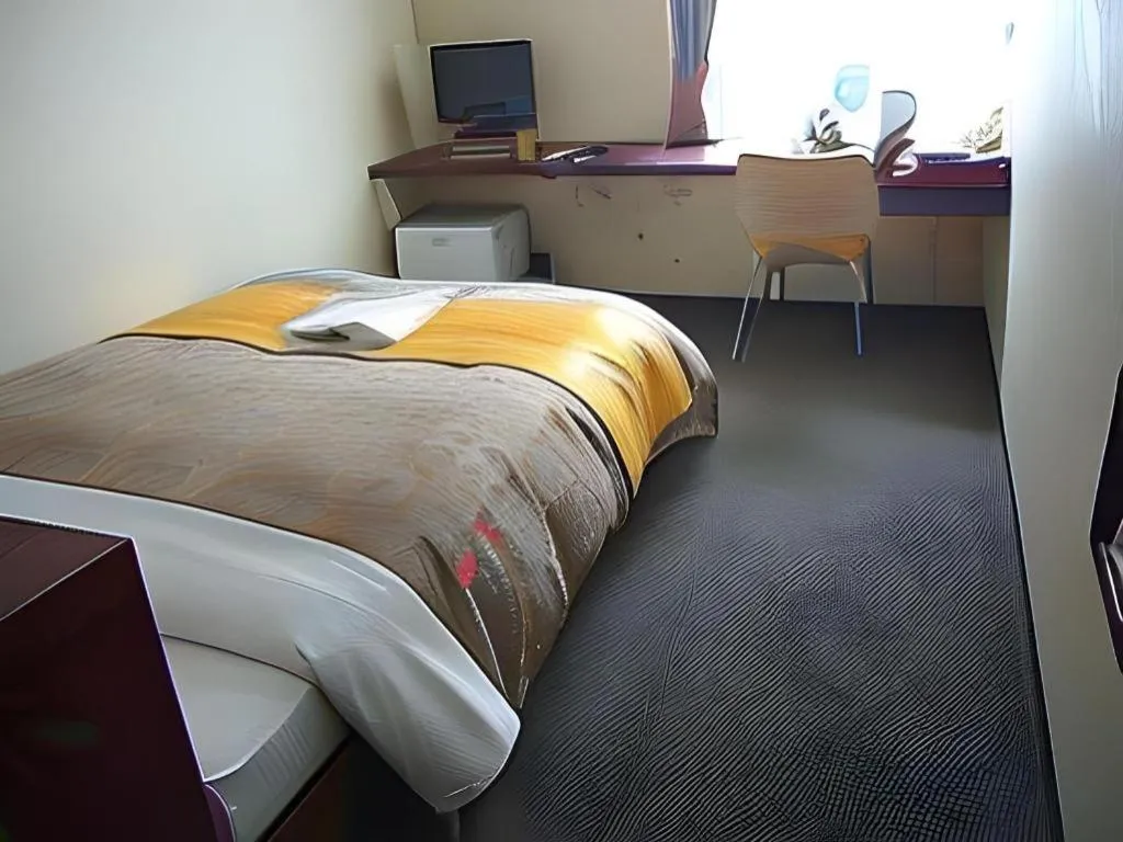 Bed in Hotel 1-2-3 Kofu Shingen Onsen