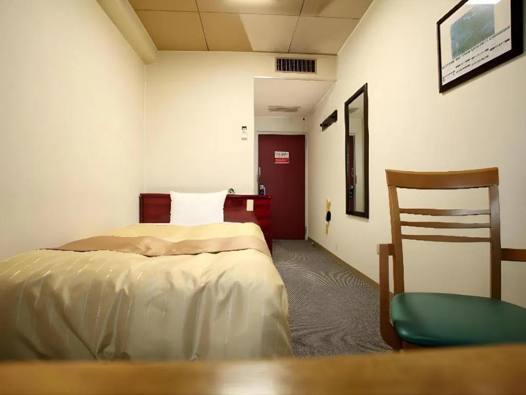 Bed in Hotel 1-2-3 Kofu Shingen Onsen