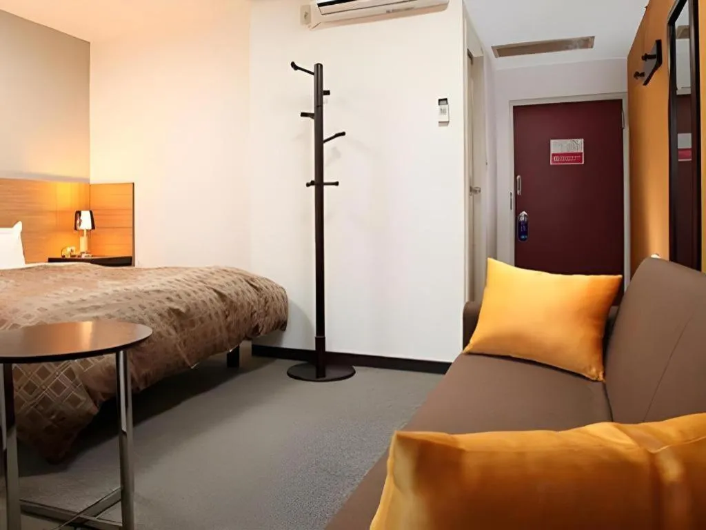 Bed in Hotel 1-2-3 Kofu Shingen Onsen