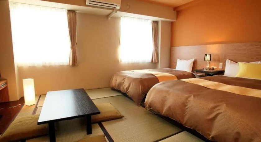 Bed in Hotel 1-2-3 Kofu Shingen Onsen