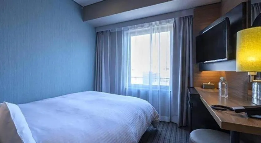 Bed in HOTEL UNIZO Osaka Yodoyabashi