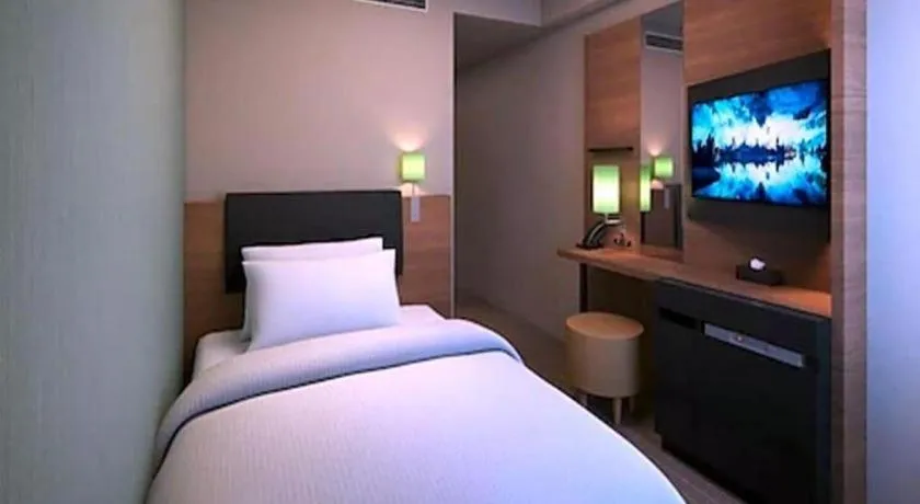 Bed in HOTEL UNIZO Osaka Yodoyabashi