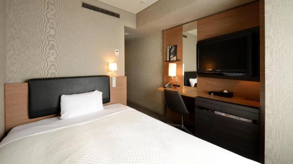 Bed in HOTEL UNIZO Osaka Yodoyabashi