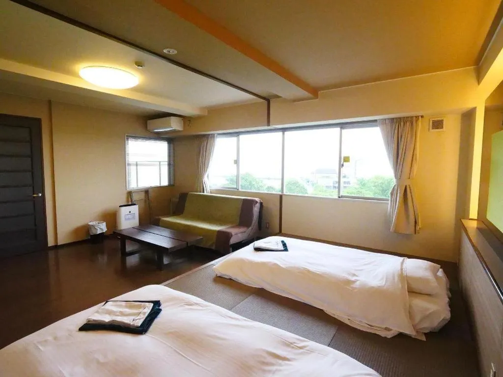 Bed in Green Hotel Yes Nagahama Minatokan