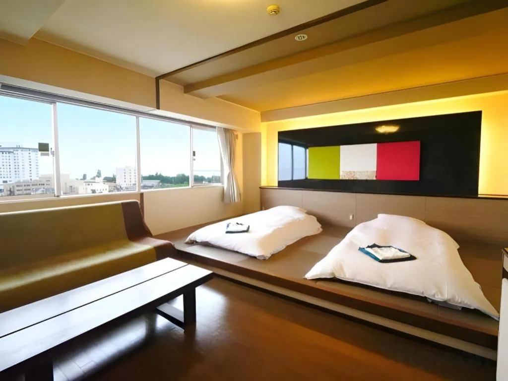 Bed in Green Hotel Yes Nagahama Minatokan
