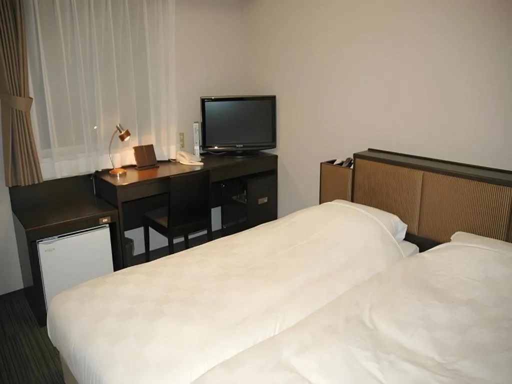 Bed in Green Hotel Yes Nagahama Minatokan