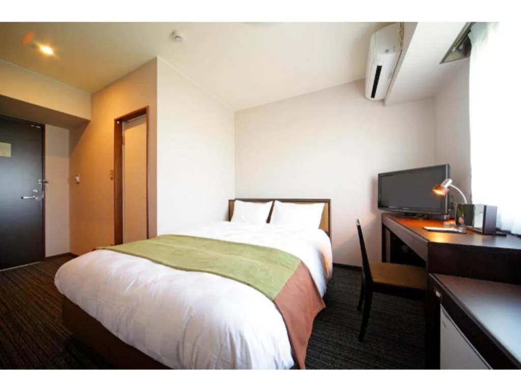 Bed in Green Hotel Yes Nagahama Minatokan