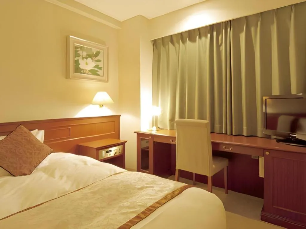 Bed in Hotel Harvest In Yonago