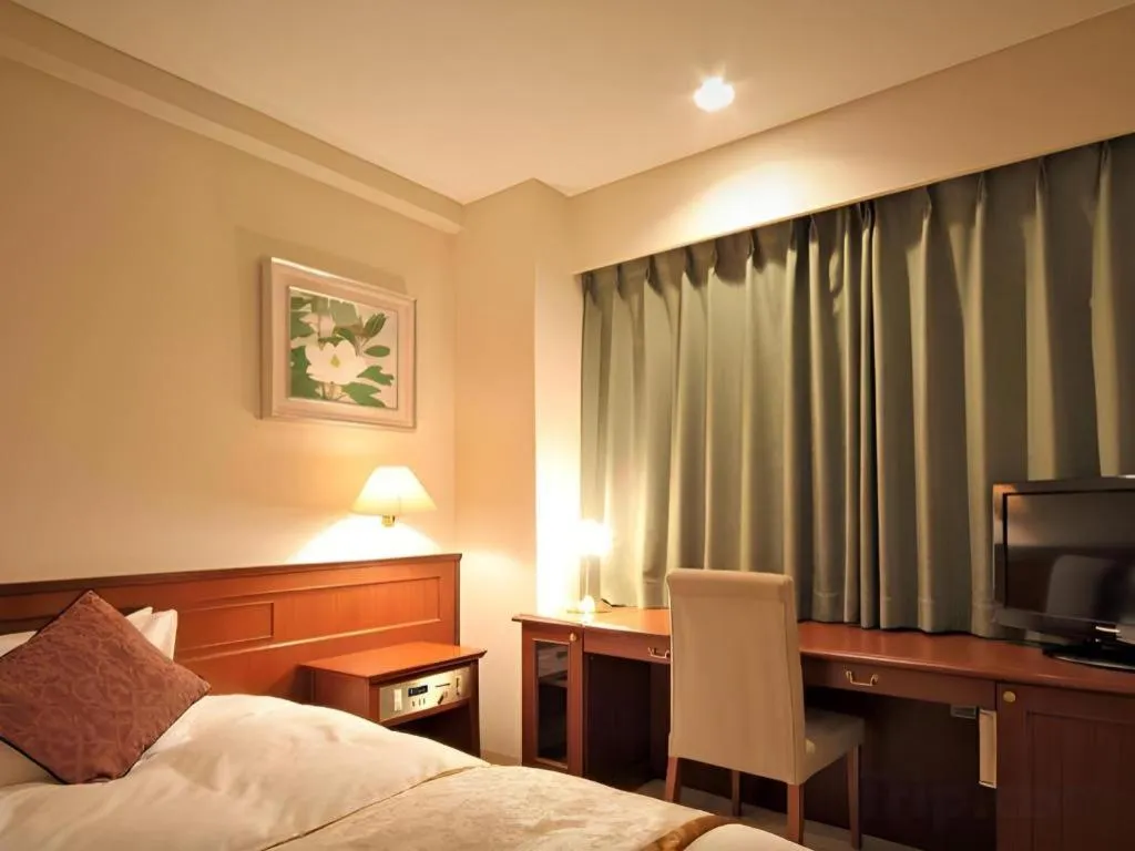 Bed in Hotel Harvest In Yonago