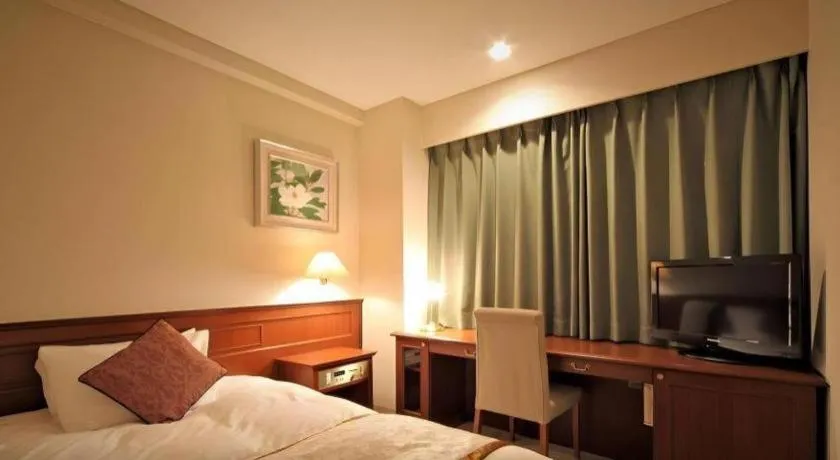 Bed in Hotel Harvest In Yonago