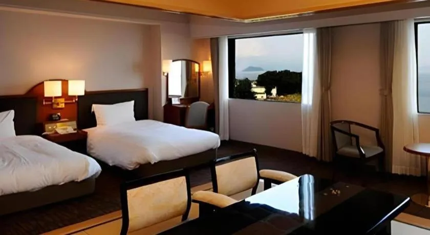 Bed in Imazu Sun Bridge Hotel
