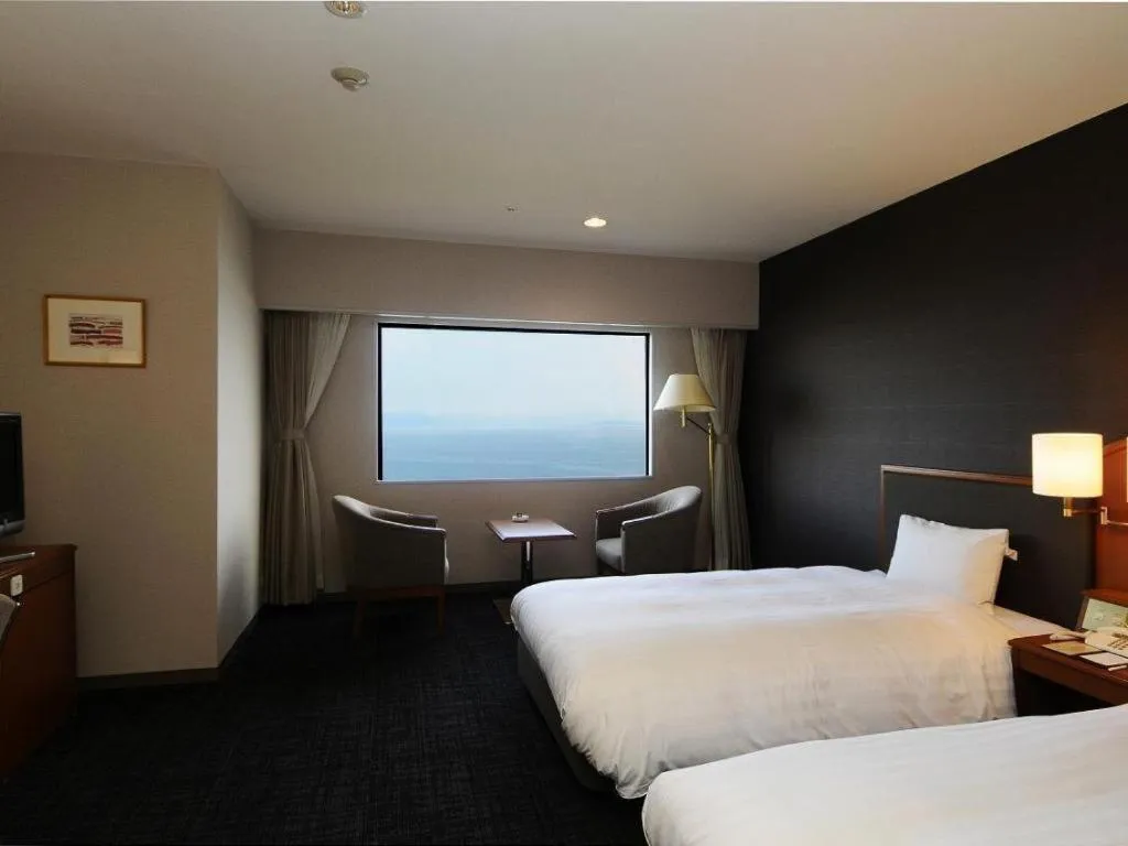 Bed in Imazu Sun Bridge Hotel