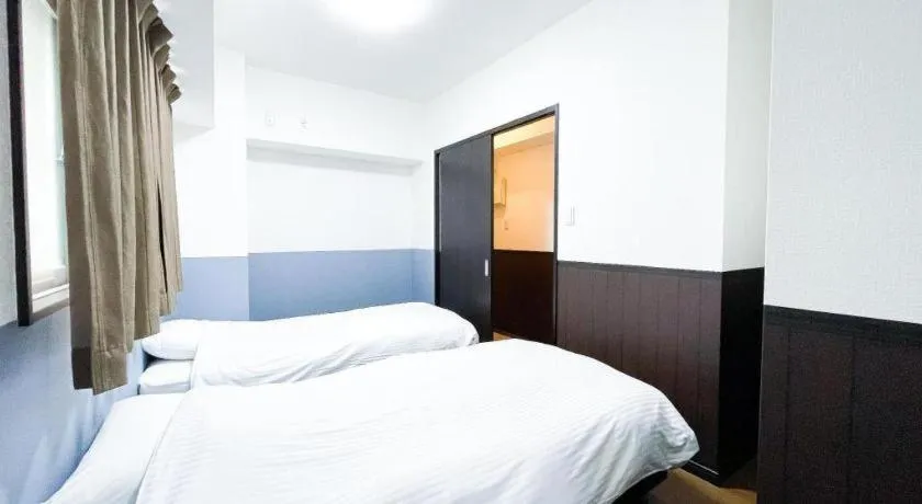 Bed in Villa Coast Nishimachi - Guesthouse in Okinawa