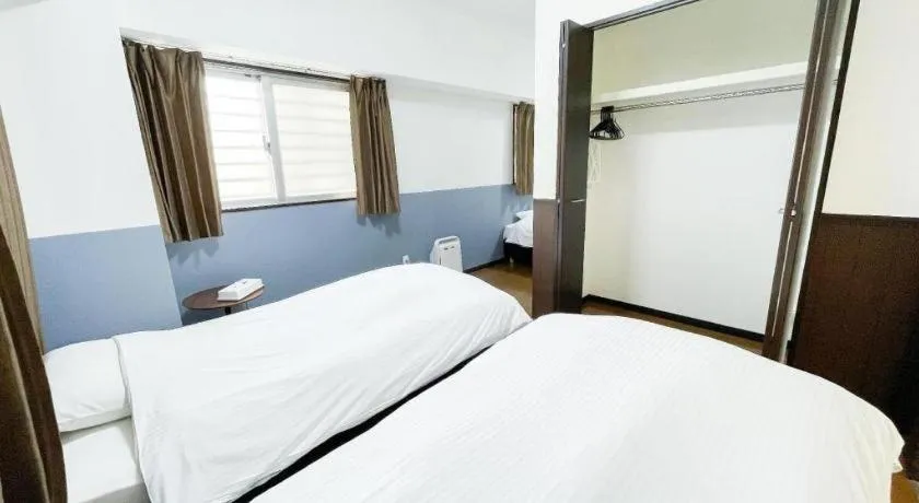 Bed in Villa Coast Nishimachi - Guesthouse in Okinawa