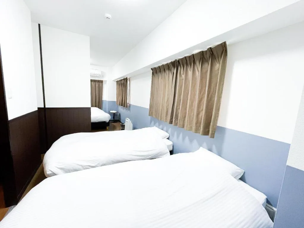 Bed in Villa Coast Nishimachi - Guesthouse in Okinawa