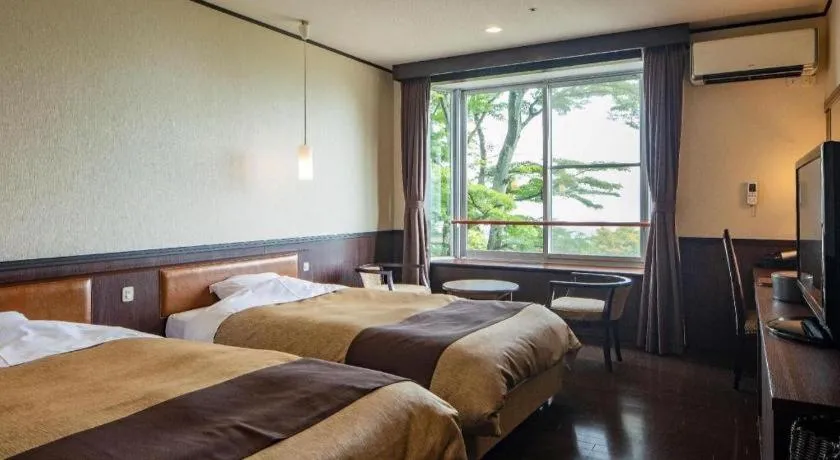 Bed in Hotel Kogure