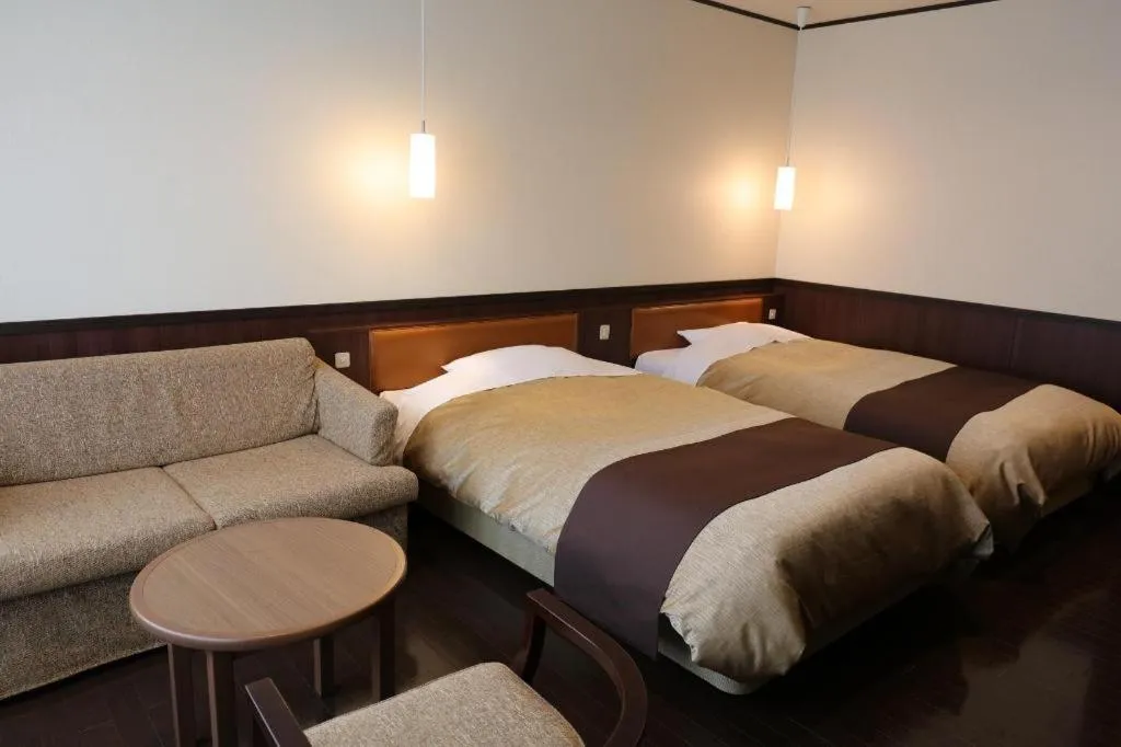 Bed in Hotel Kogure