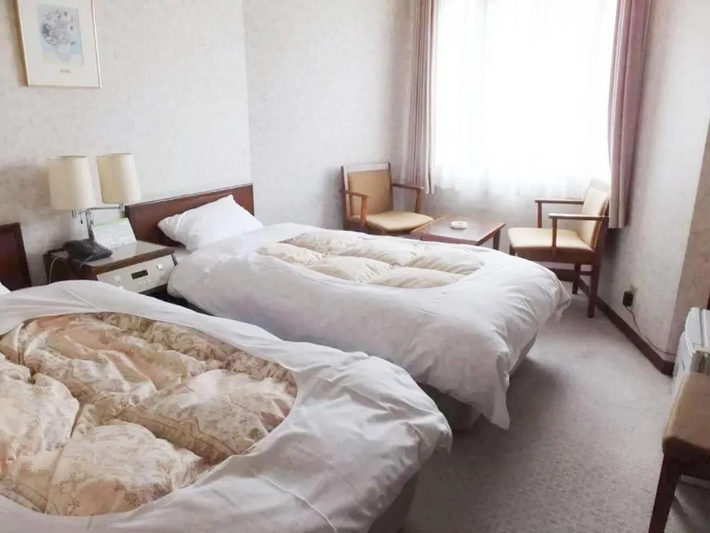 Bed in Sento Otani Hotel