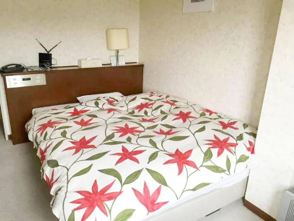 Bed in Sento Otani Hotel