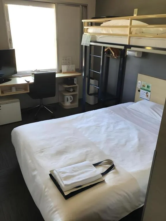 Bed in Super Hotel Arai-Niigata