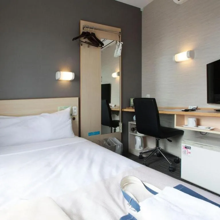 Bed in Super Hotel Arai-Niigata