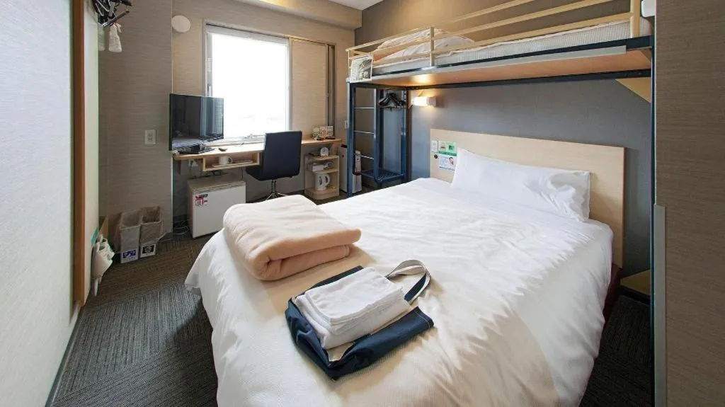 Bed in Super Hotel Arai-Niigata