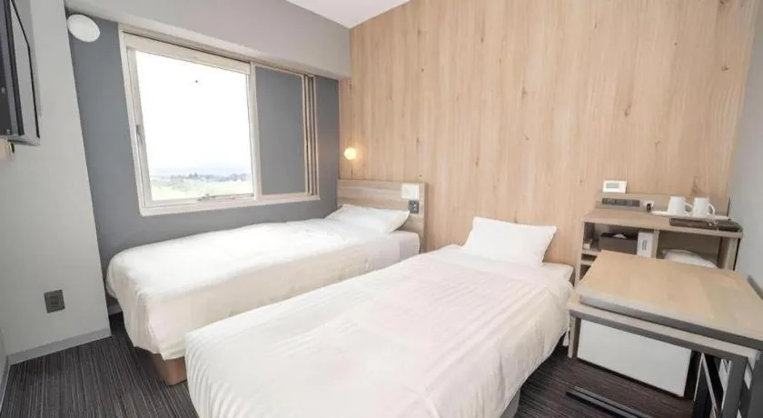 Bed in Super Hotel Arai-Niigata