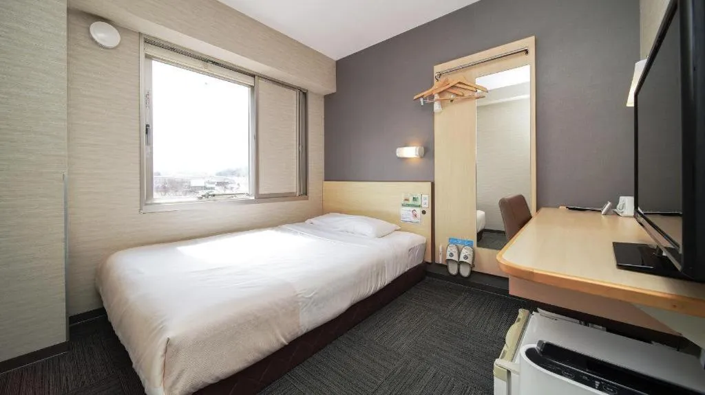 Bed in Super Hotel Arai-Niigata