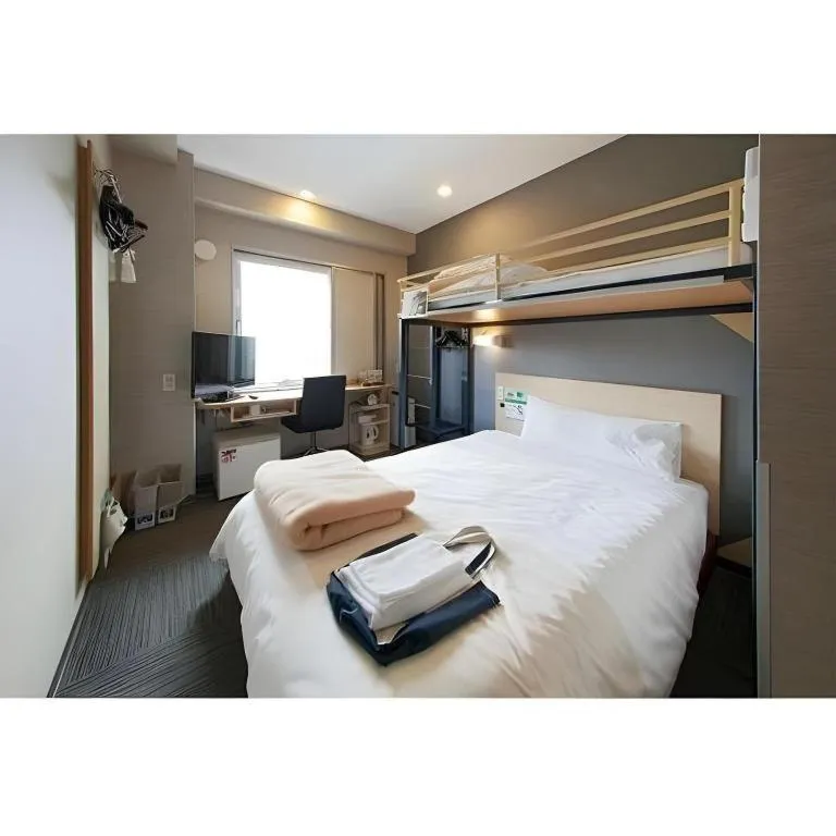 Bed in Super Hotel Arai-Niigata