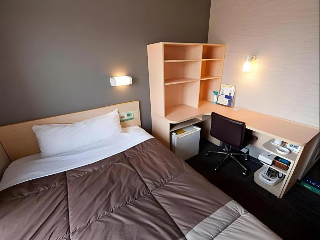 Bed in Super Hotel Arai-Niigata