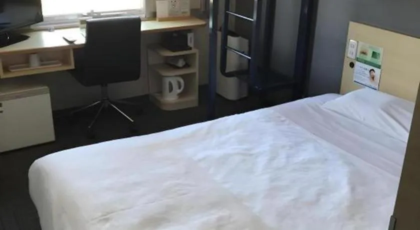 Bed in Super Hotel Arai-Niigata