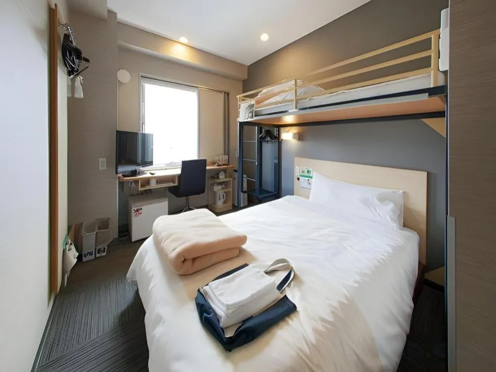 Bed in Super Hotel Arai-Niigata