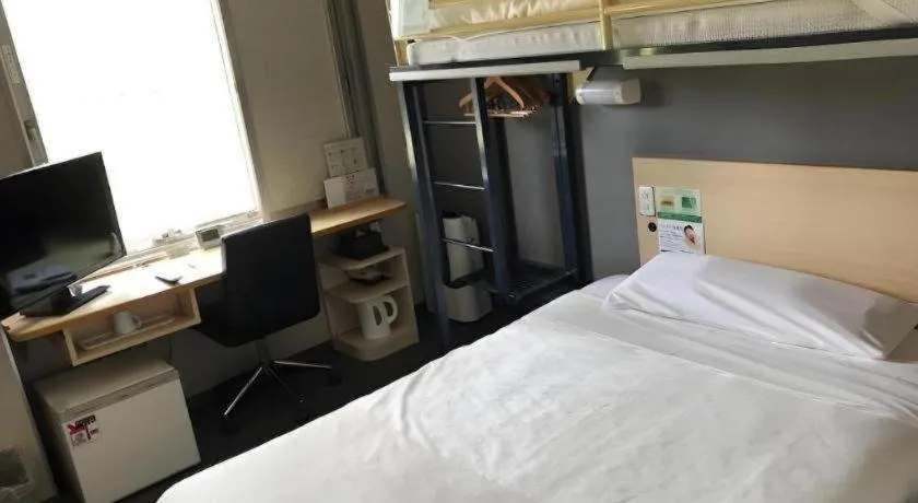 Bed in Super Hotel Arai-Niigata