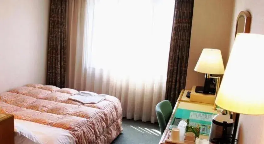 Bed in Palace Inn Toyota Bed in Palace Inn Toyota