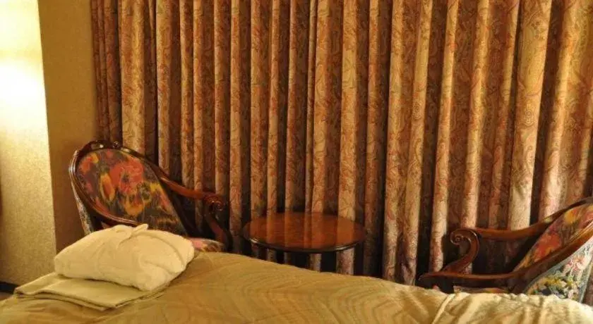 Bed in Palace Inn Toyota Bed in Palace Inn Toyota