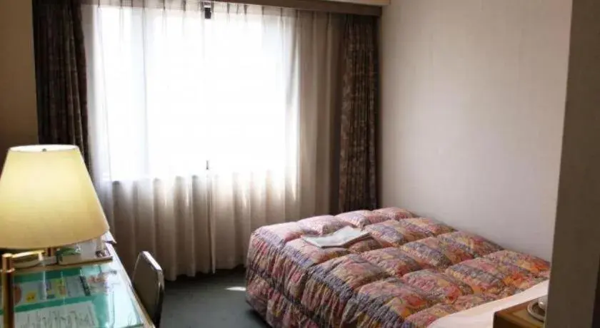 Bed in Palace Inn Toyota Bed in Palace Inn Toyota