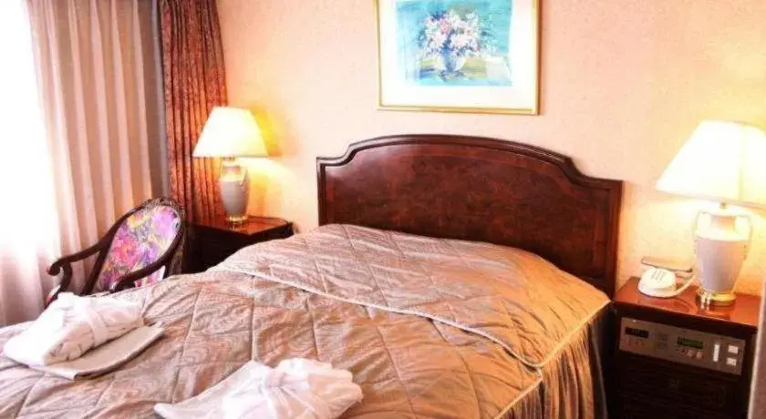 Bed in Palace Inn Toyota Bed in Palace Inn Toyota