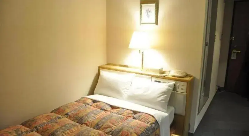 Bed in Palace Inn Toyota Bed in Palace Inn Toyota