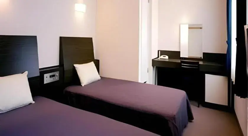 Bed in Hirata Maple Hotel Bed in Hirata Maple Hotel